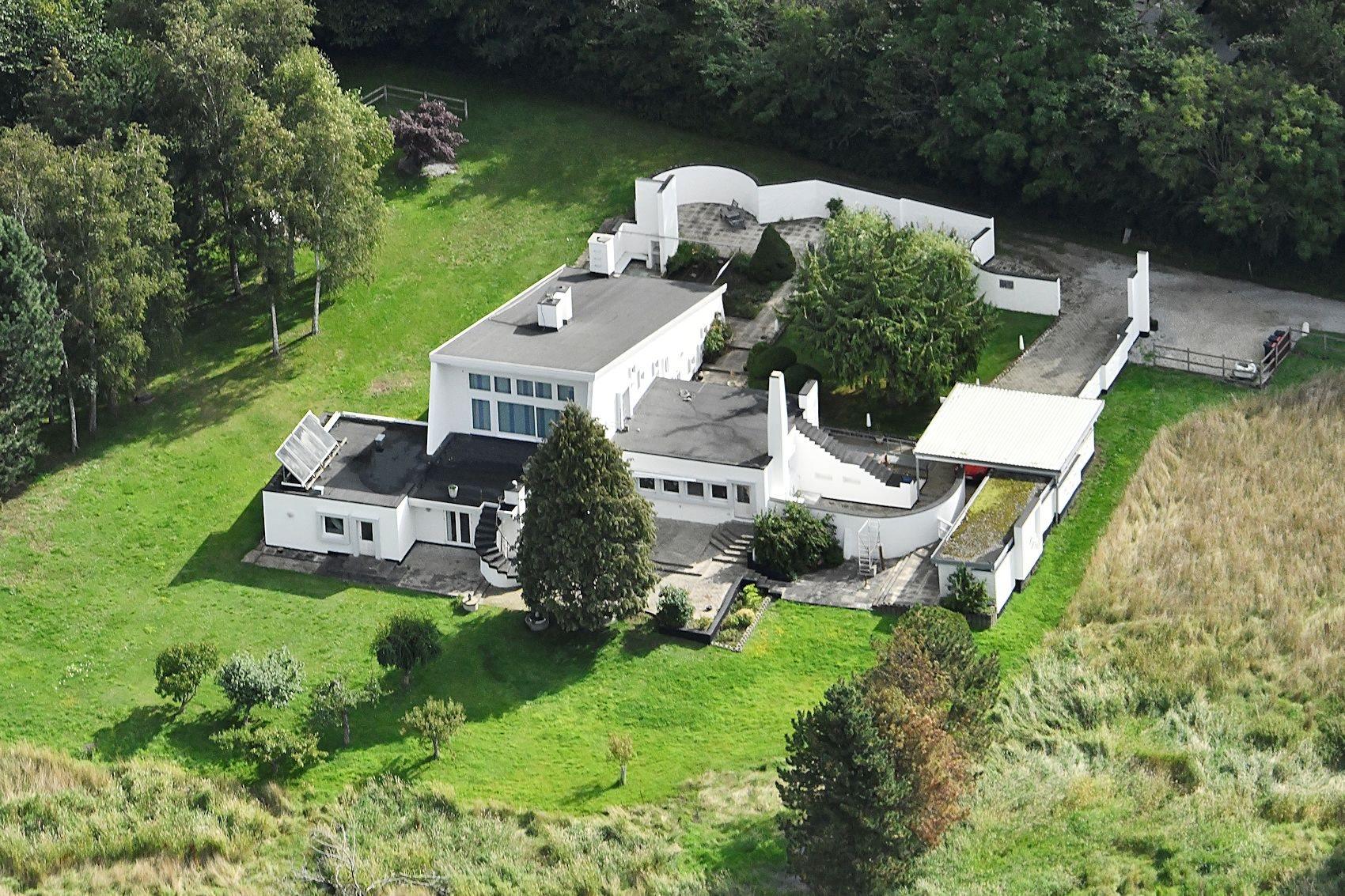 house overview showing roofs with no rails